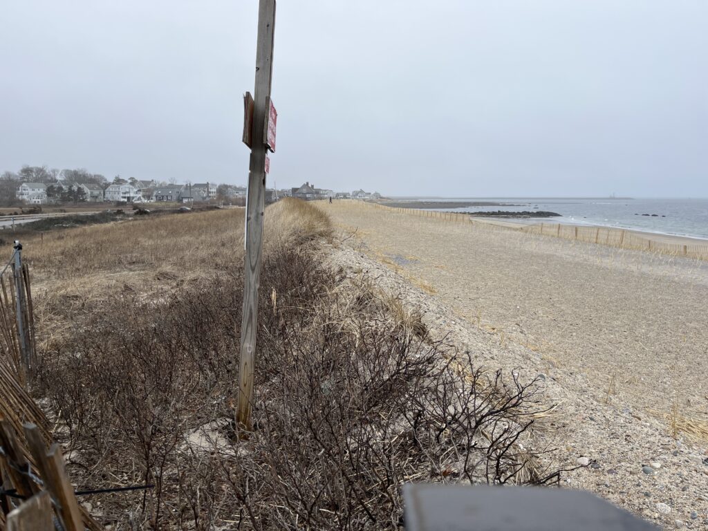 a beach with a sign (MyCoast AI)