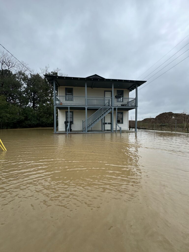 a house on a flooded area (MyCoast AI)