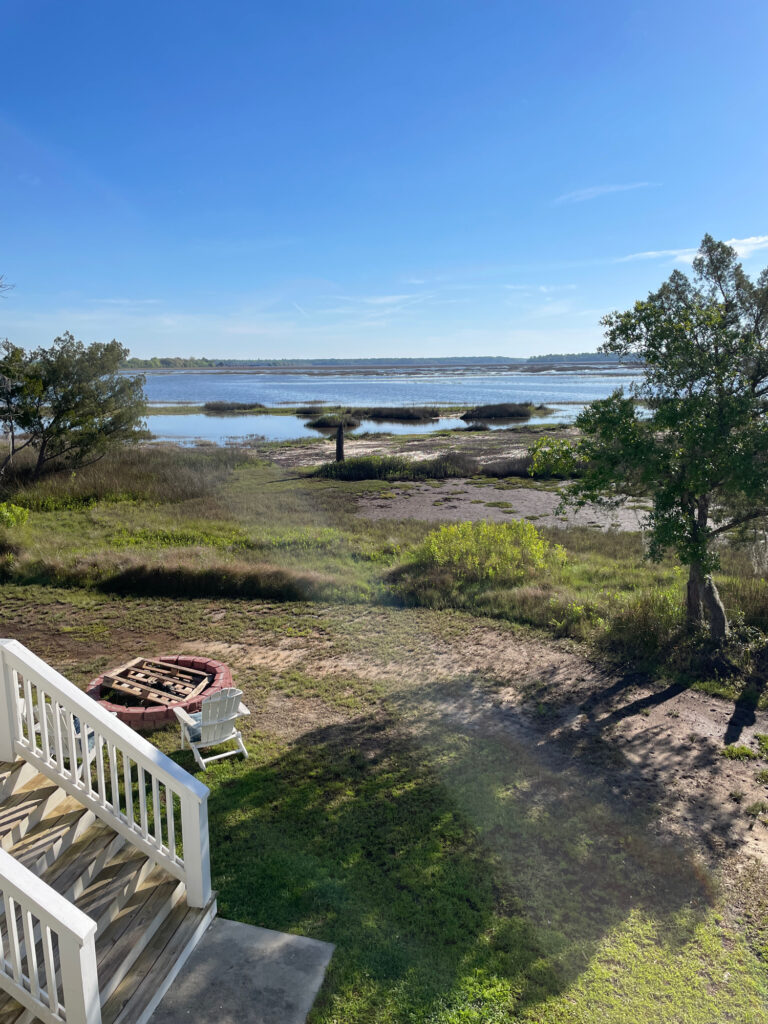 a bench on a path by a body of water (MyCoast AI)