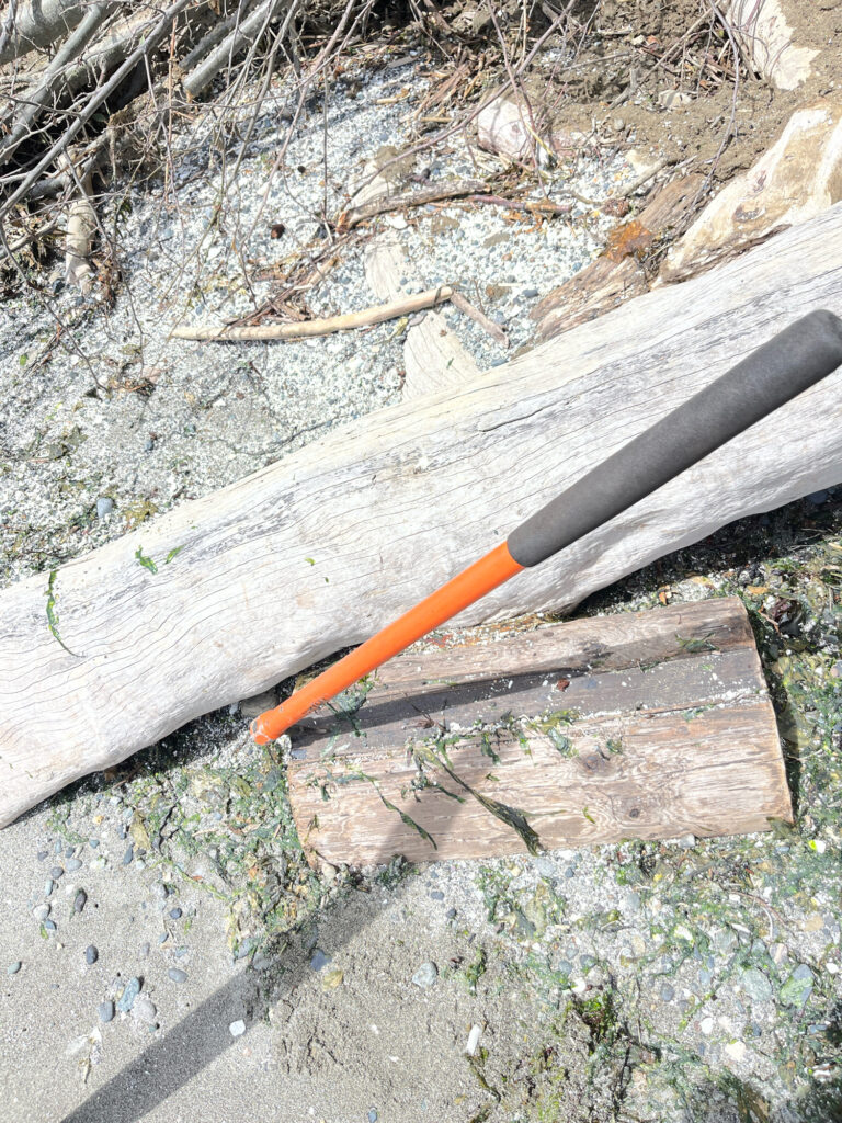 a wooden fence with a stick in it (MyCoast AI)