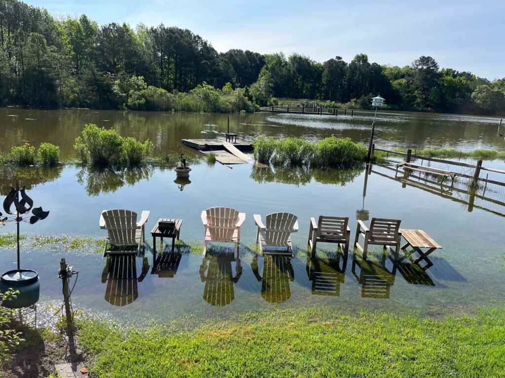 a lake with chairs and tables (MyCoast AI)