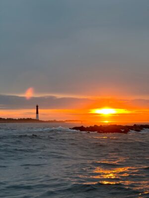 a sunset over a body of water (MyCoast AI)