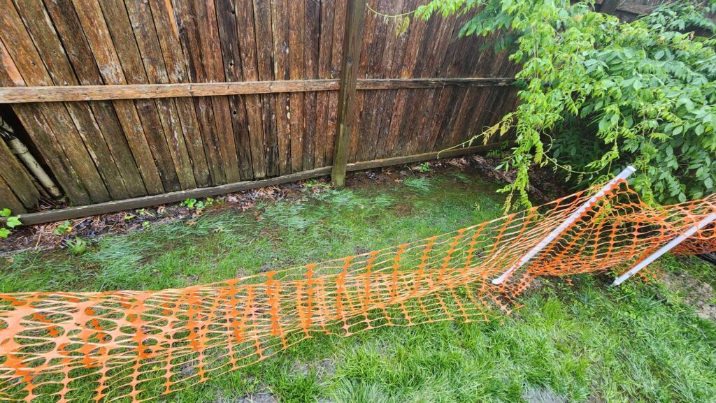 a fence with a stream of water (MyCoast AI)