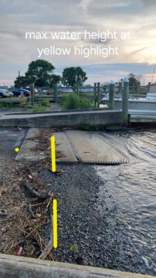 a train track with a bridge in the background (MyCoast AI)