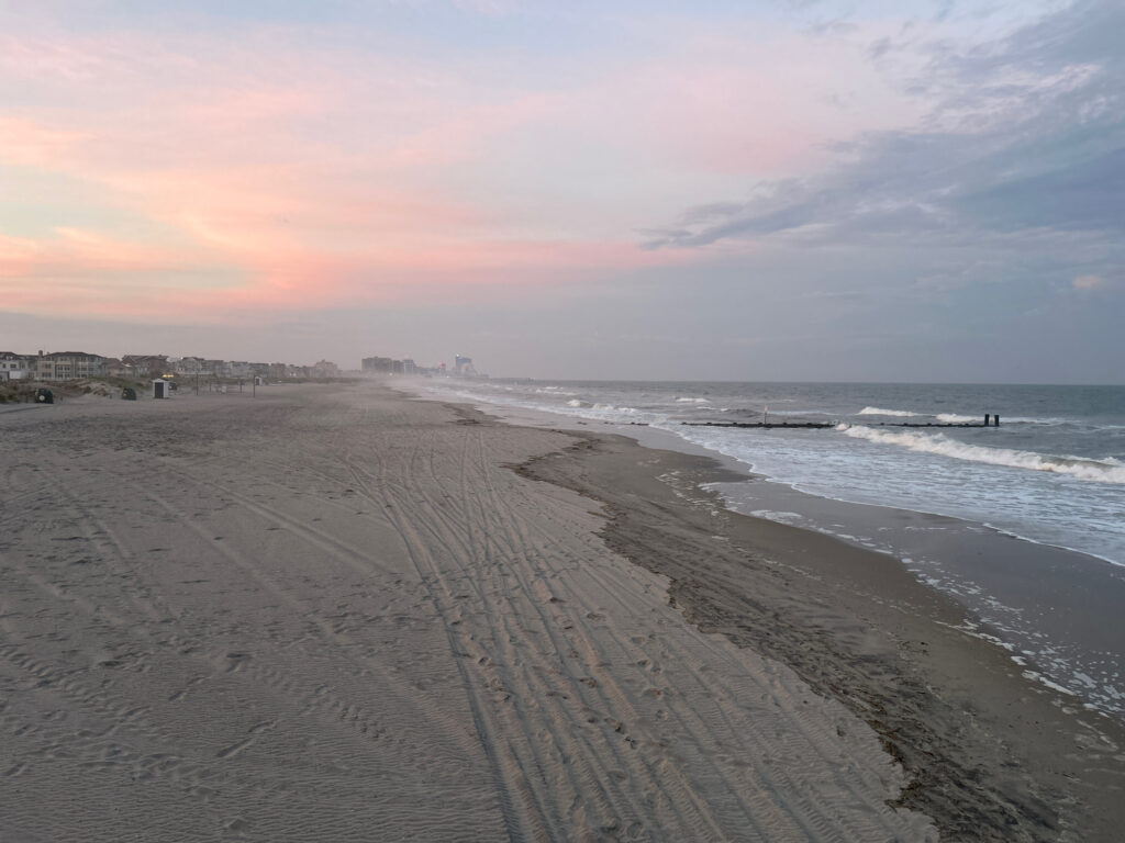 a beach with waves crashing on it (MyCoast AI)