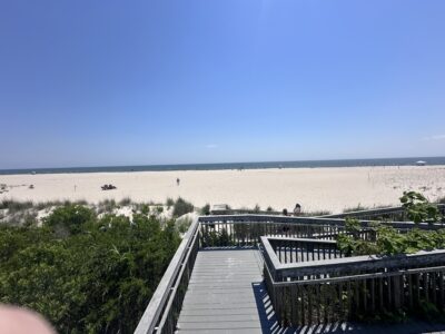 a boardwalk leading to a beach (MyCoast AI)