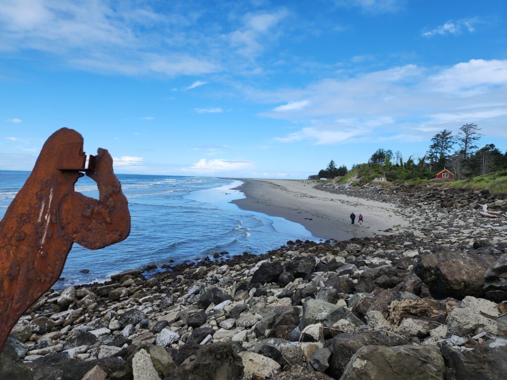 a rocky beach with a large rock (MyCoast AI)
