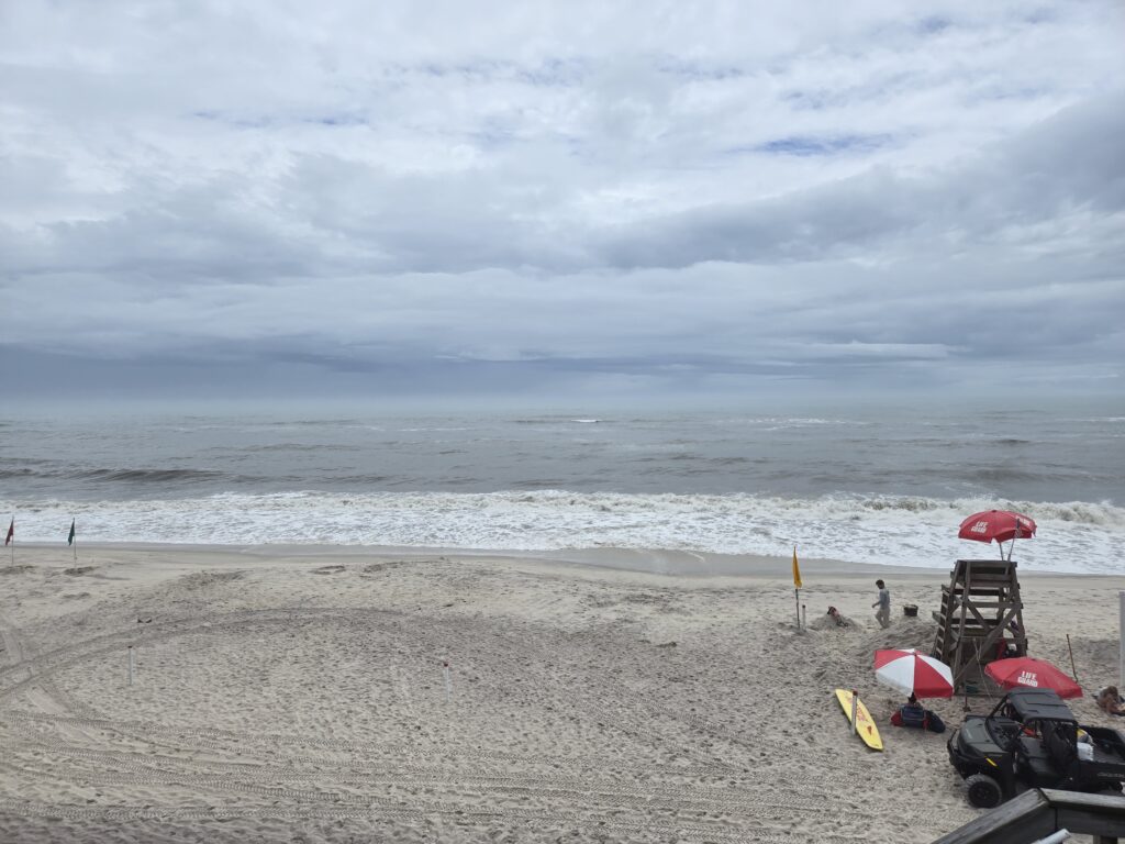 a beach with umbrellas and chairs (MyCoast AI)
