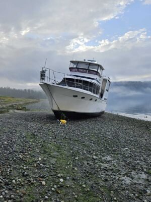 a boat on a rocky beach (MyCoast AI)