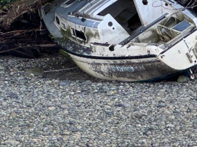 a wrecked car on the ground (MyCoast AI)