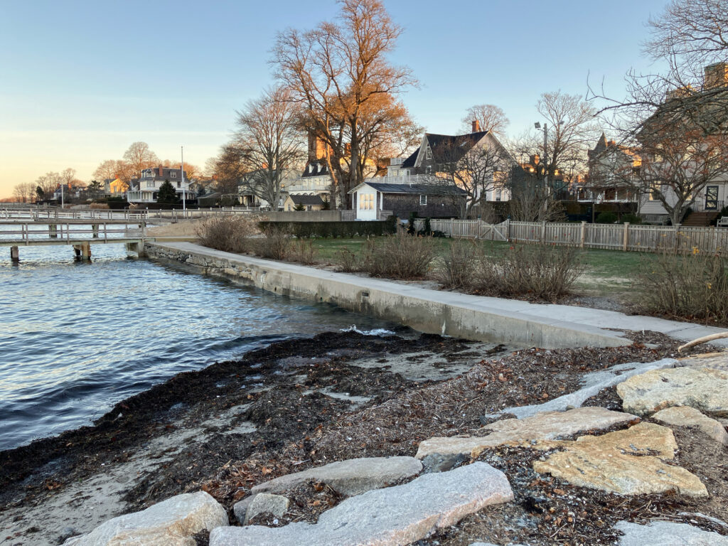 a river with a bridge and houses along it (MyCoast AI)