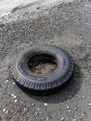 a tire on the ground (MyCoast AI)