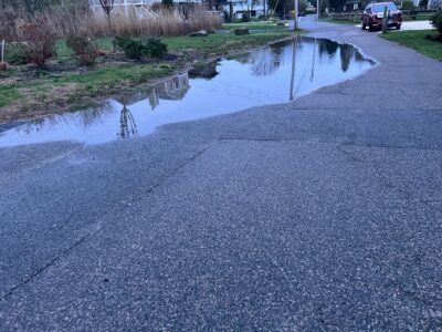 a road with water on the side (MyCoast AI)