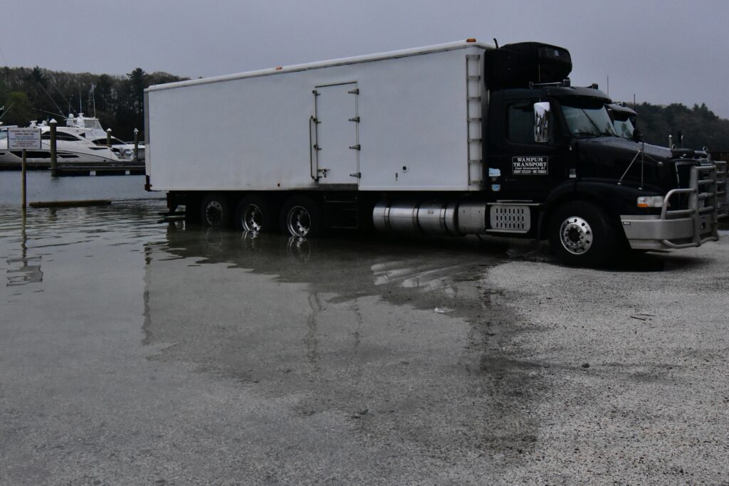 a truck on a wet road (MyCoast AI)