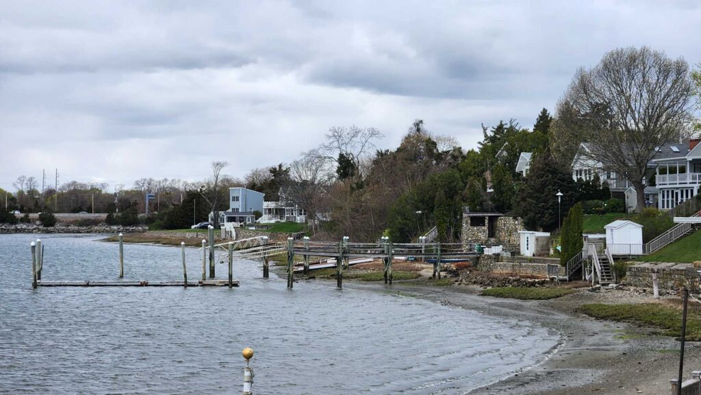 a body of water with houses along it (MyCoast AI)