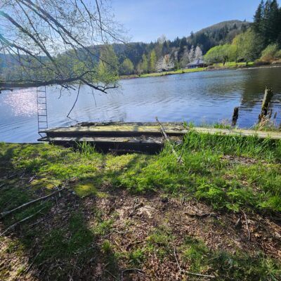a lake with a dock (MyCoast AI)