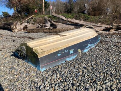 a boat on a rocky beach (MyCoast AI)