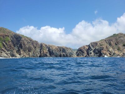 a body of water with mountains in the background (MyCoast AI)