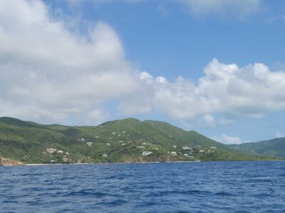 a body of water with a hill in the background (MyCoast AI)