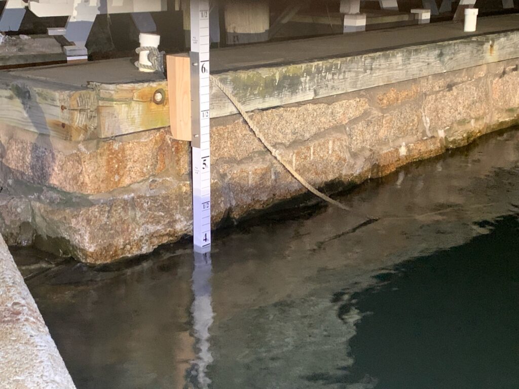a large water pipe in a concrete wall (MyCoast AI)