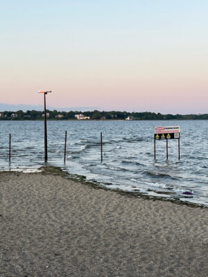 a beach with a sign (MyCoast AI)