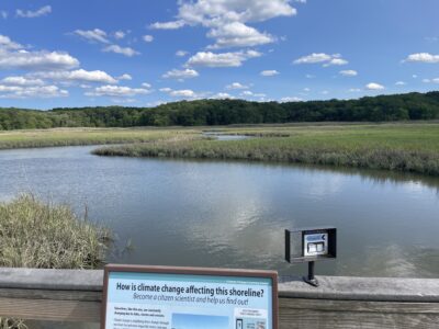 a lake with a sign (MyCoast AI)