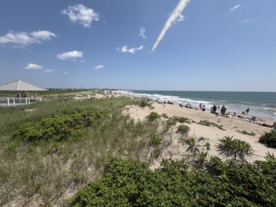 a beach with people on it (MyCoast AI)