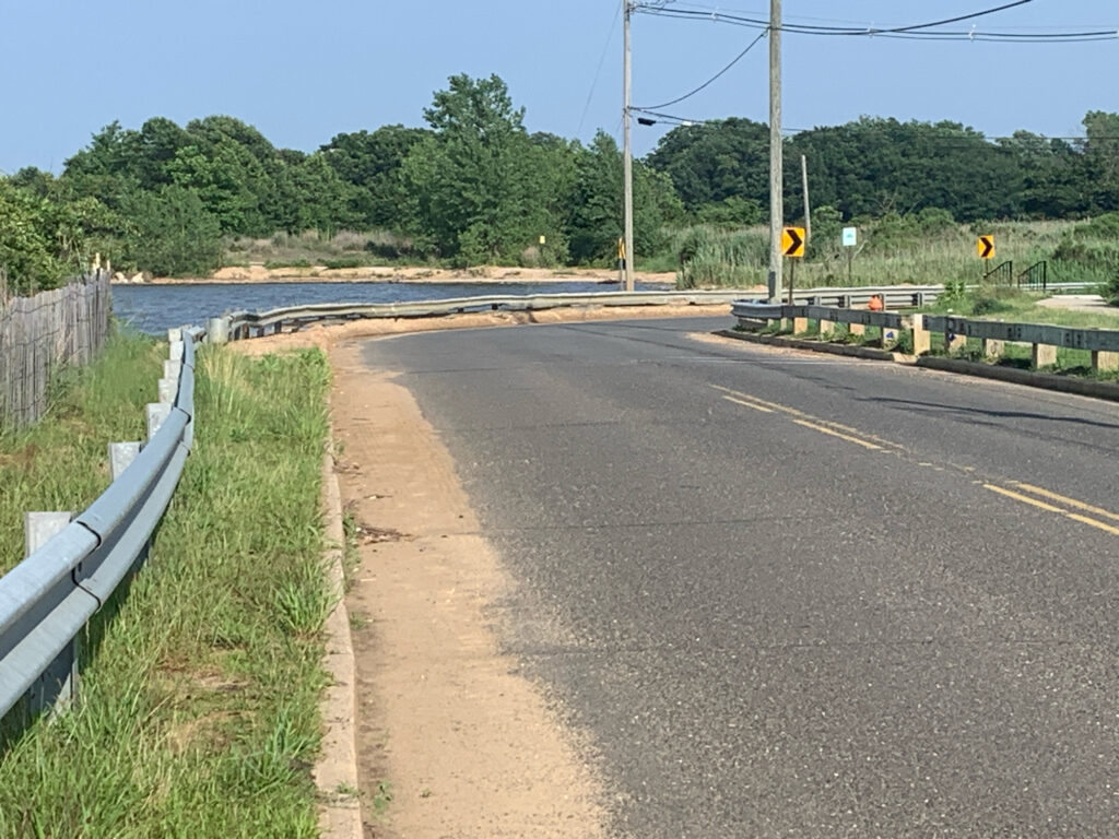 a road with a bridge over it (MyCoast AI)
