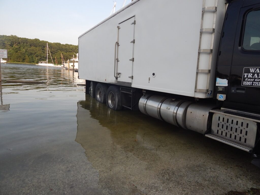 a truck parked in a flooded area (MyCoast AI)