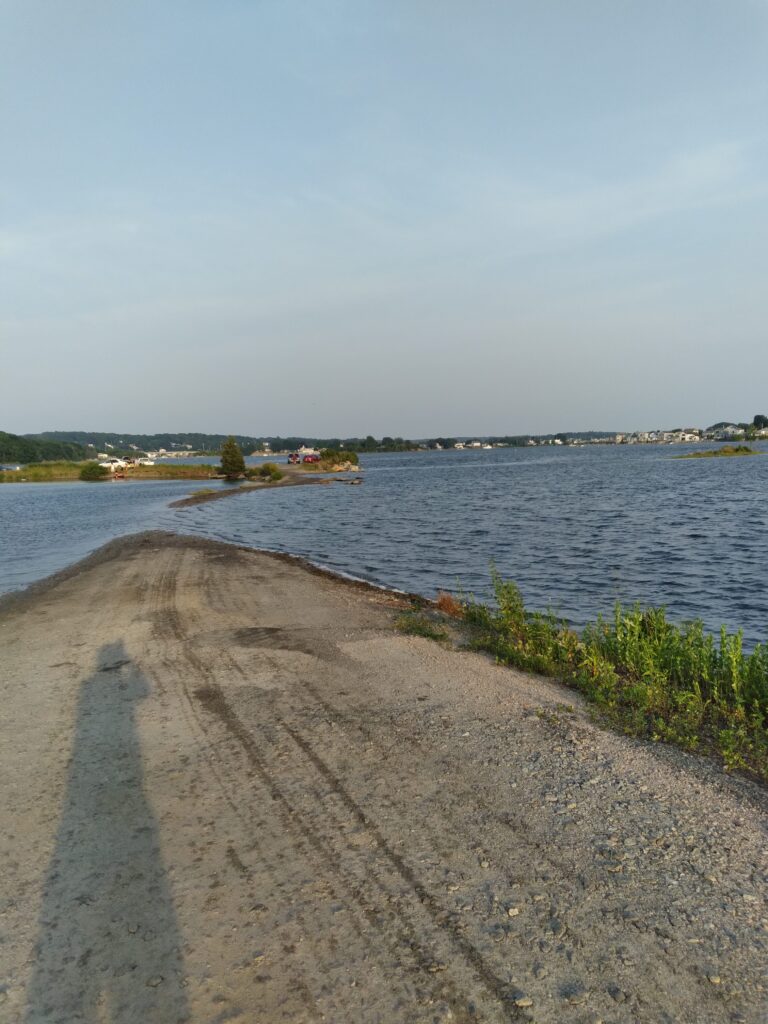 a path next to a body of water (MyCoast AI)