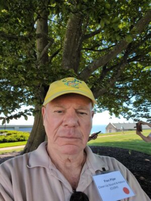 a man wearing a yellow hat (MyCoast AI)