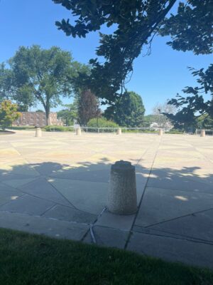 a concrete area with trees and grass (MyCoast AI)