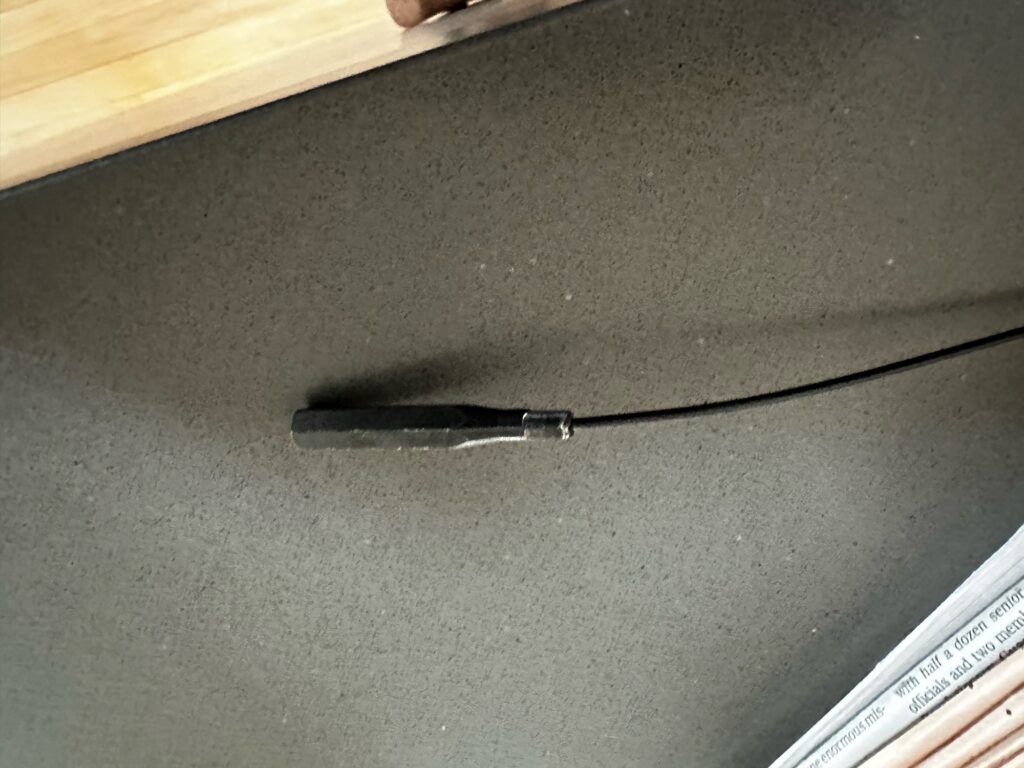 a black pen on a table (MyCoast AI)