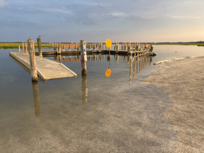 a wooden dock over water (MyCoast AI)