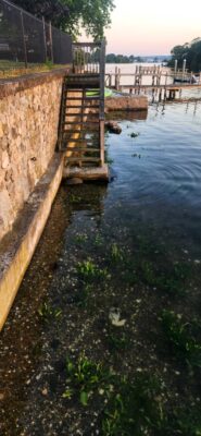 a wooden bridge over a river (MyCoast AI)