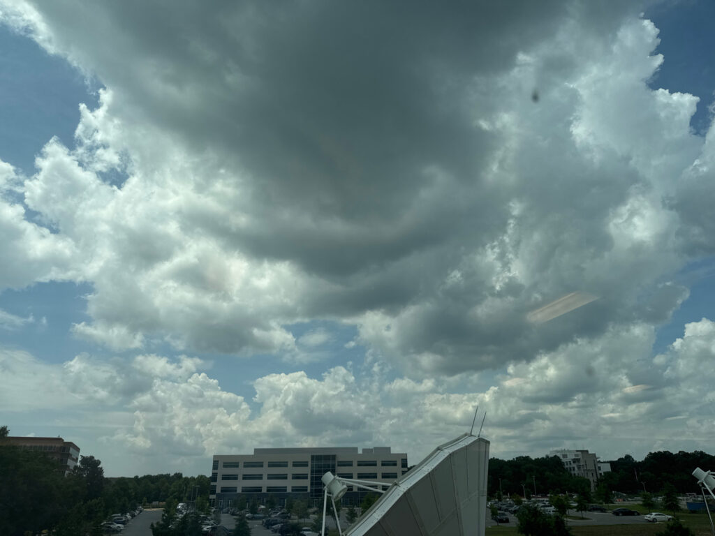 a building with a cloudy sky above (MyCoast AI)