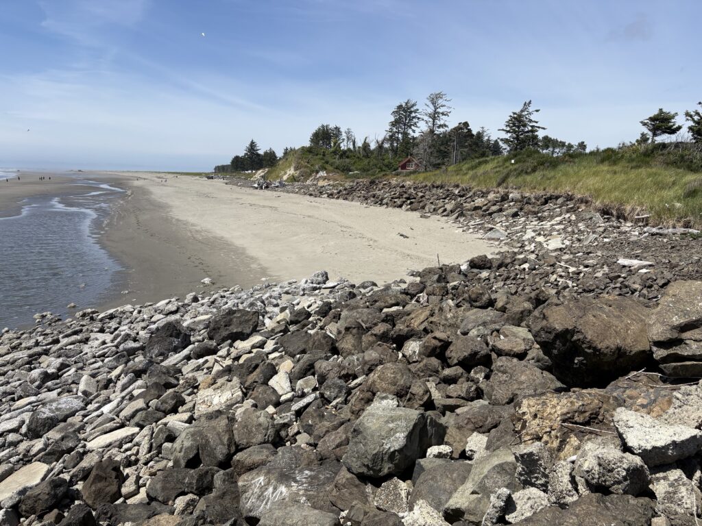 a rocky beach with a sandy beach (MyCoast AI)