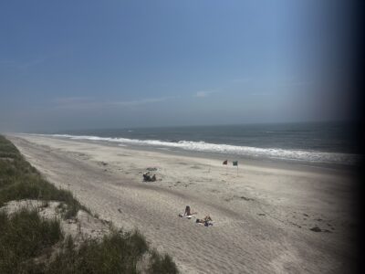 a beach with people on it (MyCoast AI)