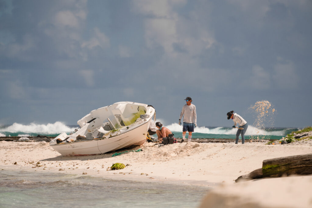 a group of people on a beach (MyCoast AI)