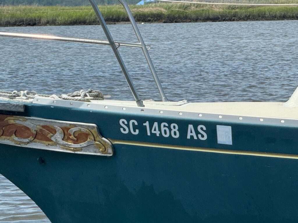 a boat with a fish on it (MyCoast AI)