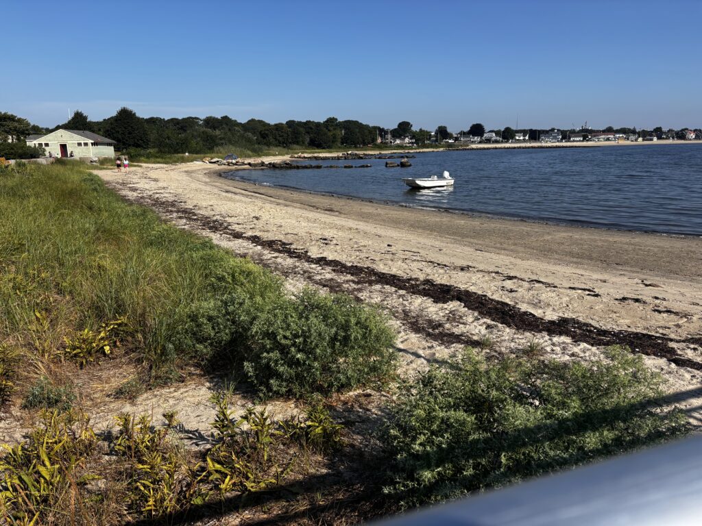 a beach with boats on it (MyCoast AI)