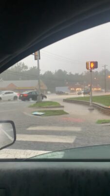 a view of a street from a car window (MyCoast AI)