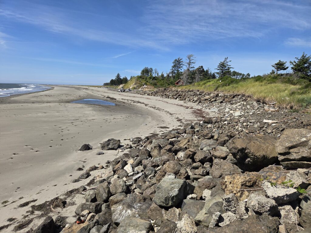 a rocky beach with a small pool (MyCoast AI)