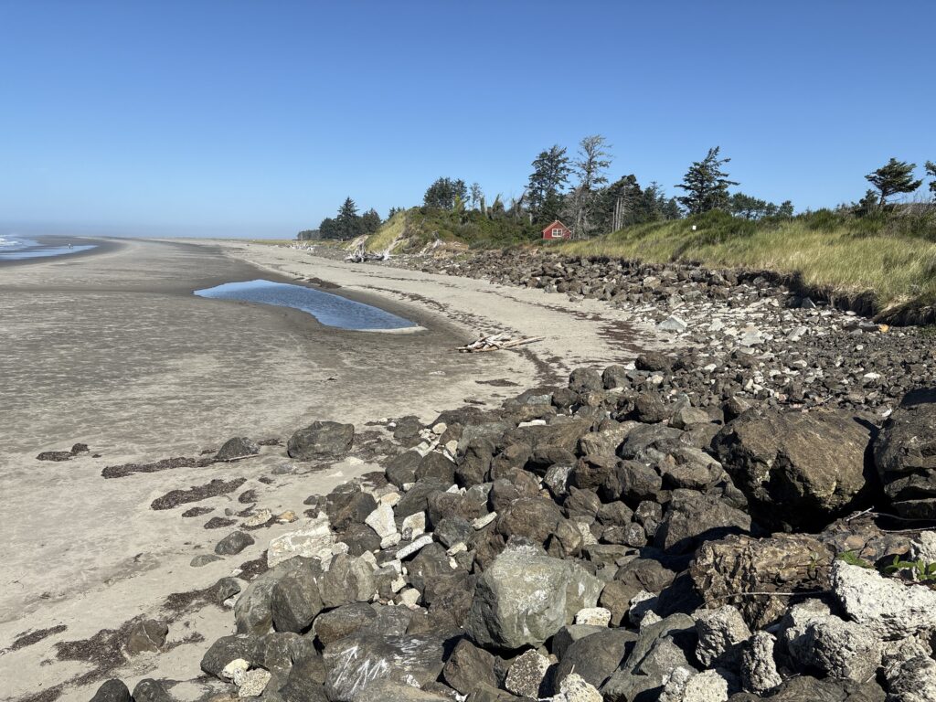 a rocky beach with a small pool (MyCoast AI)