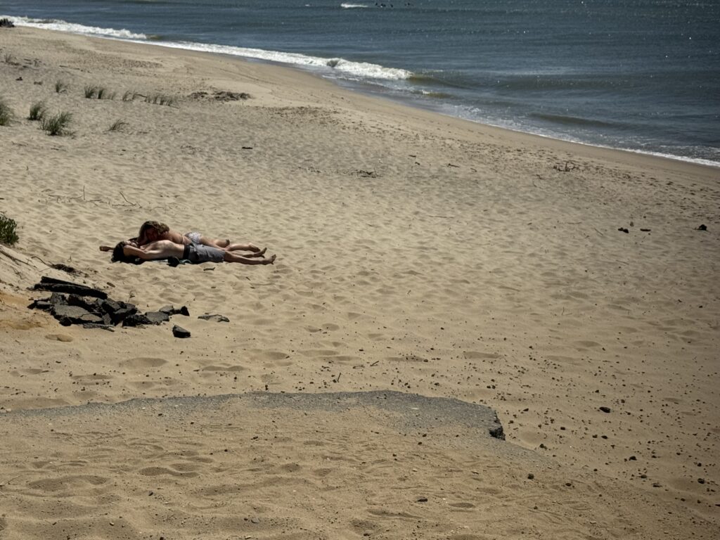 a person lying on the beach (MyCoast AI)