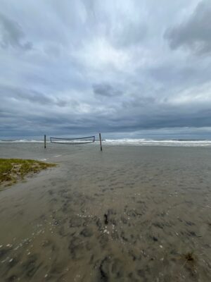 a beach with a pier (MyCoast AI)