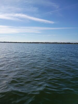 a body of water with land in the distance (MyCoast AI)