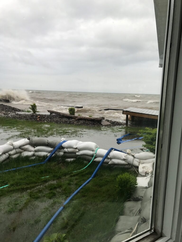 a view of the ocean from a window of a building (MyCoast AI)