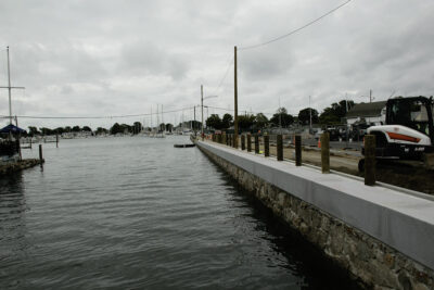a body of water with boats in it and buildings along it (MyCoast AI)