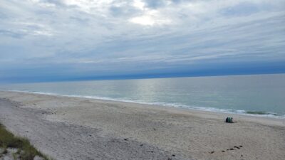 a beach with people on it (MyCoast AI)